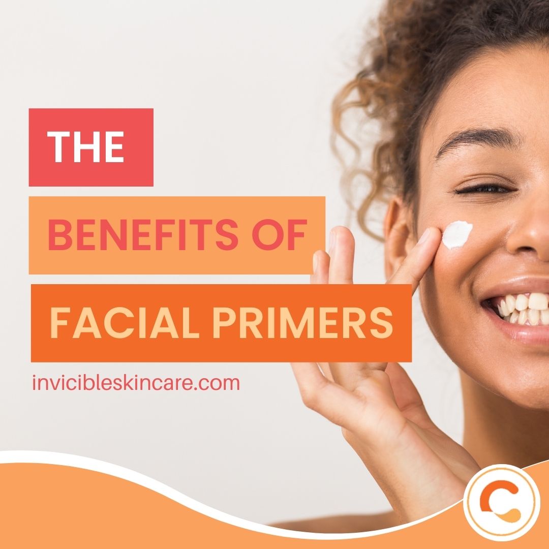 Woman smiling and applying facial primer to her cheek with her fingertip